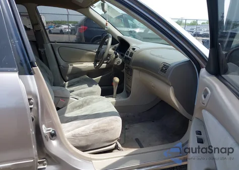 1999 Toyota Corolla Le z USA, uszkodzony, nr VIN 2T1BR12E2XC192065